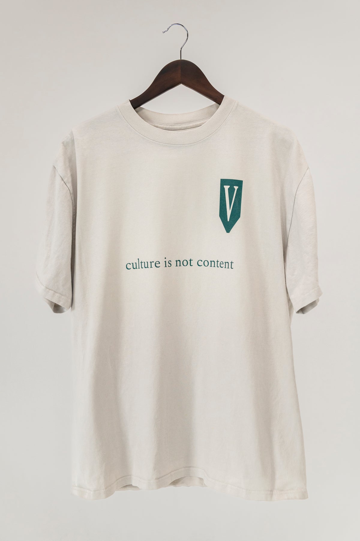 Arrival “Culture Is Not Content” Tee — Faded Bone